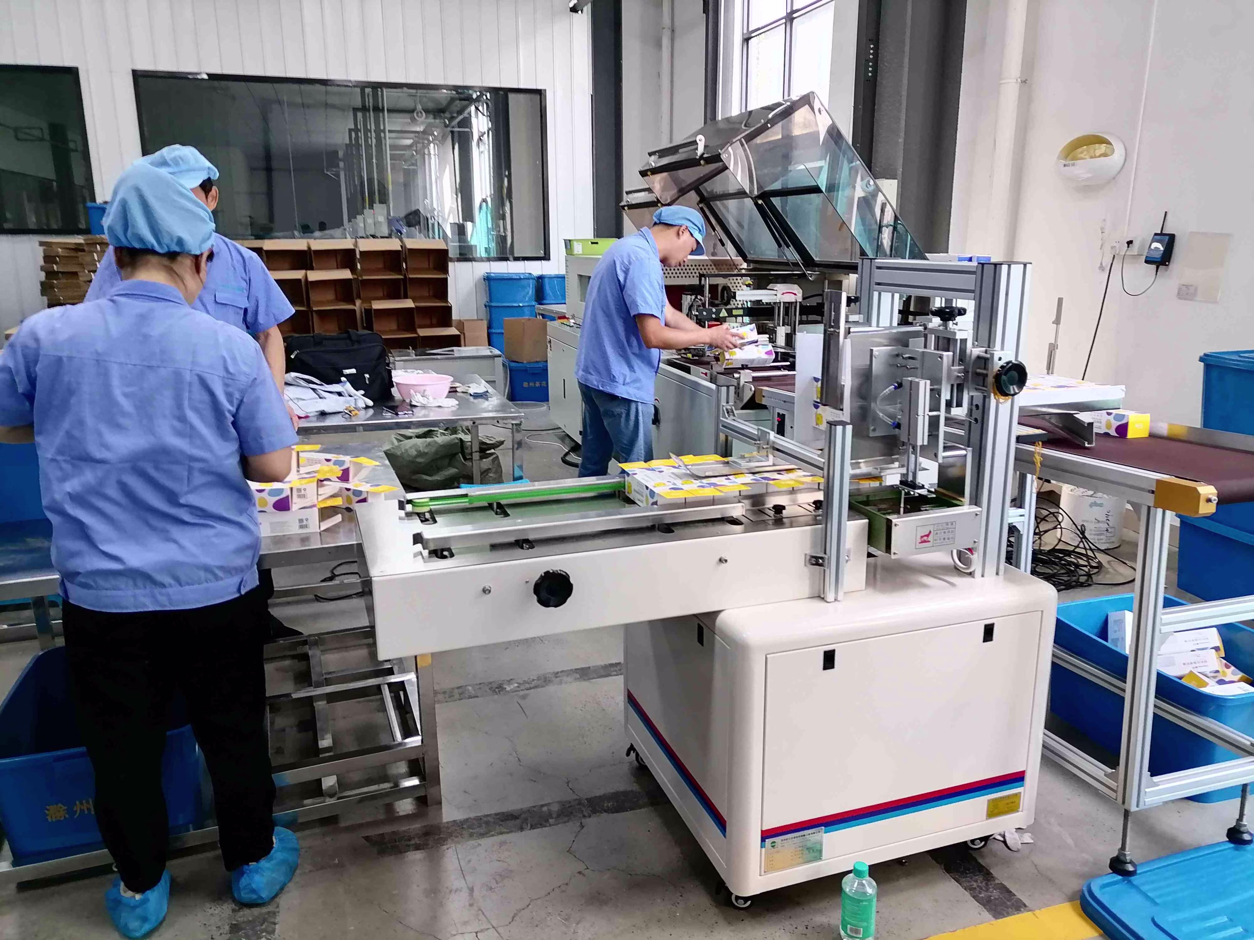 Máquina semiautomática de selagem de caixas de papelão